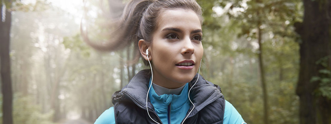 Woman jogging with music