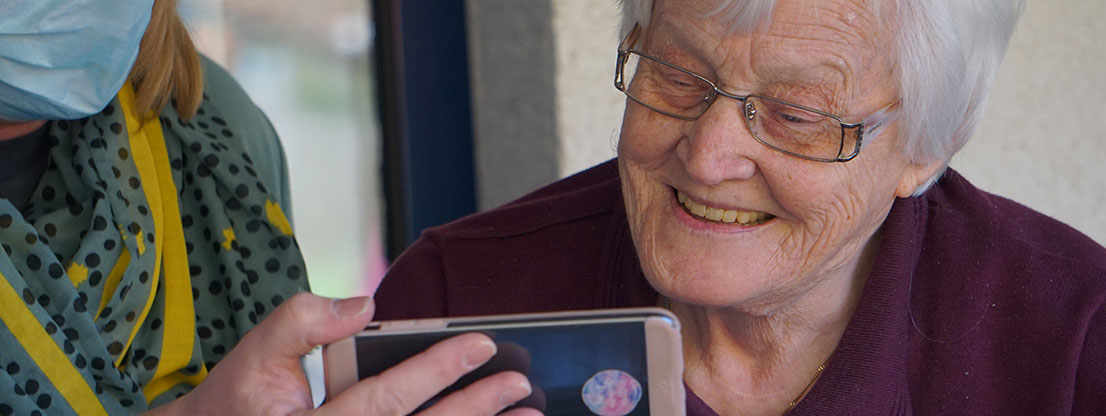 Old woman with mobile phone