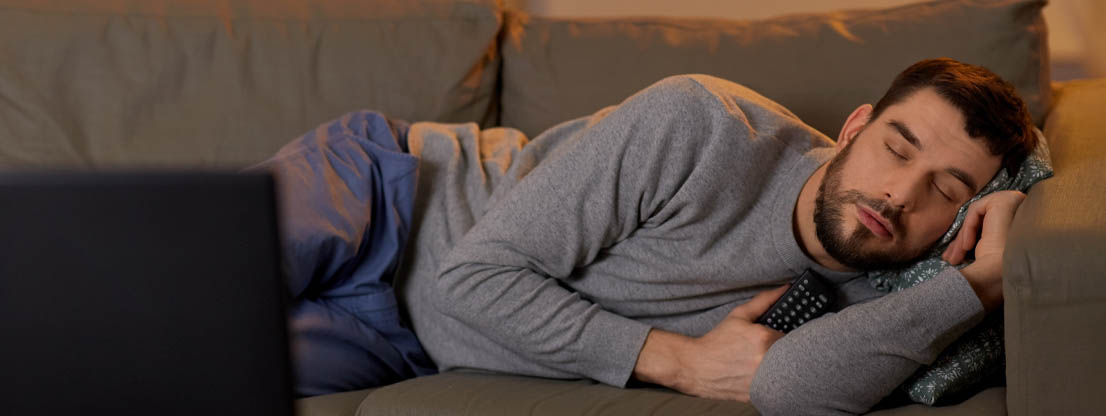 Man sleeping in front of screen