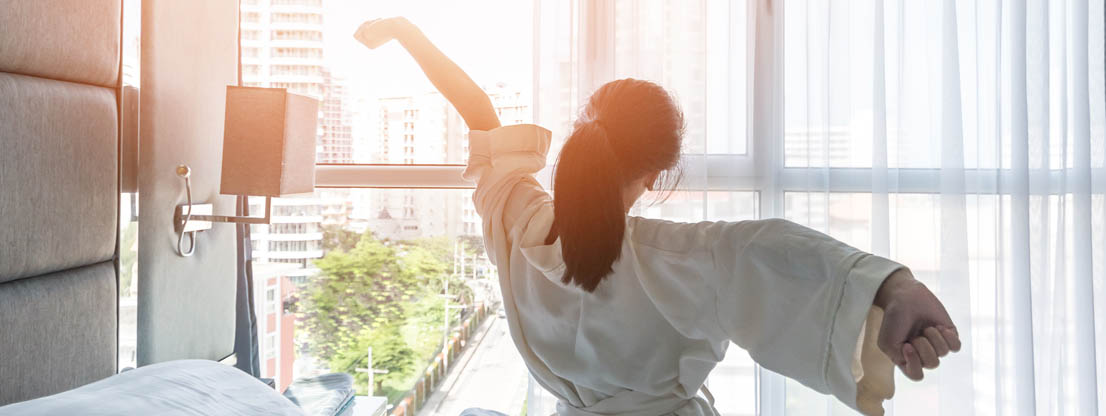 Woman wakes up with morning meditation